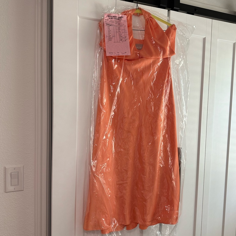 Orange cross neck midi dress. Worn once to wedding. Has been dry cleaned.